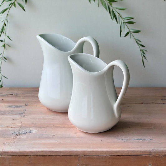 Pair of Vintage Pilivuyt French Porcelain Pitchers